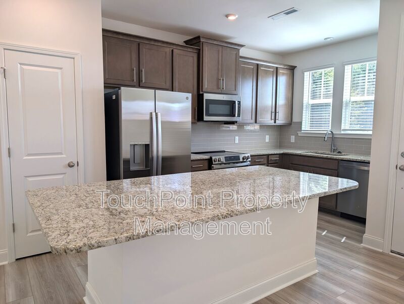 Pristine End Unit Townhome located in the Odell Park Community! property image
