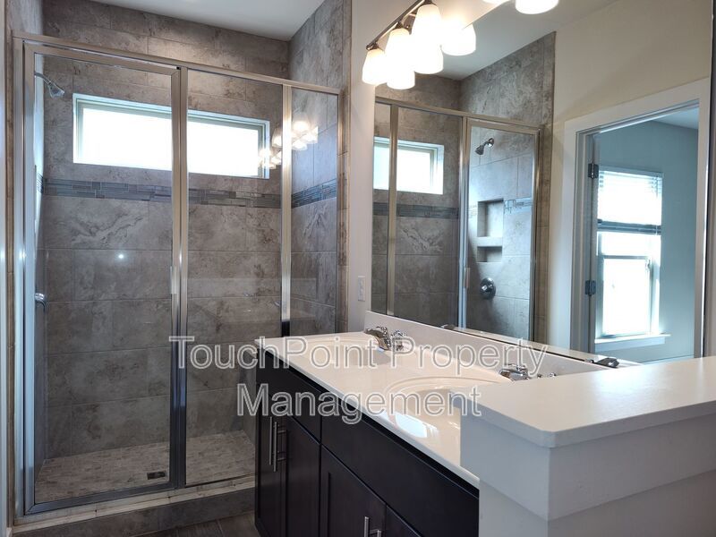 Modern End-Unit Townhome located in the Central Point Community. property image