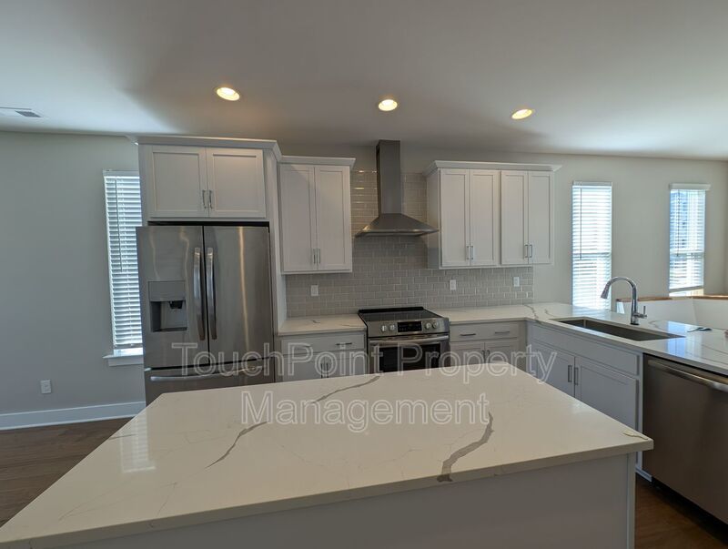 End-unit townhome in Bryant Park Terrace! 2-beds, 2-full baths, and 2-half baths. property image