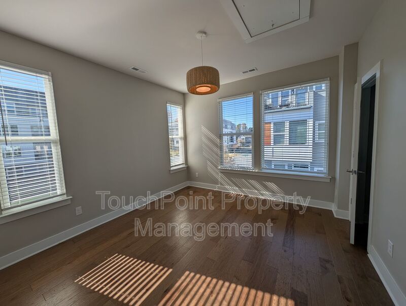 End-unit townhome in Bryant Park Terrace! 2-beds, 2-full baths, and 2-half baths. property image