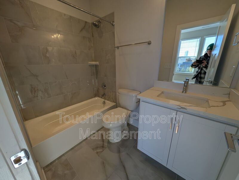 End-unit townhome in Bryant Park Terrace! 2-beds, 2-full baths, and 2-half baths. property image