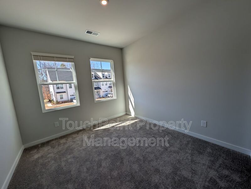 New Build, End-unit Townhome located in the Griffith Lakes Community! property image