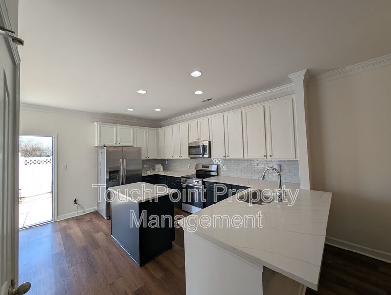 Pristine End Unit Townhome located in the Prosperity Place community! property image