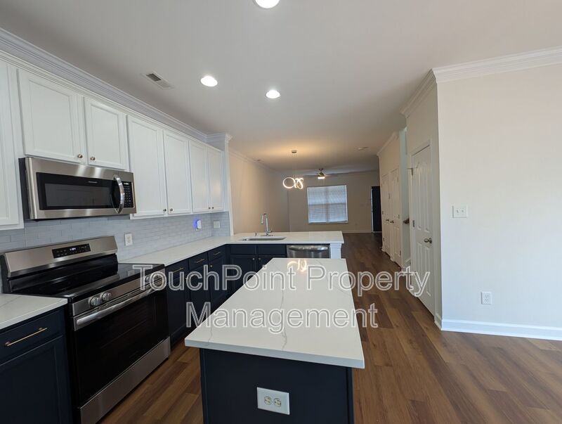 Pristine End Unit Townhome located in the Prosperity Place community! property image