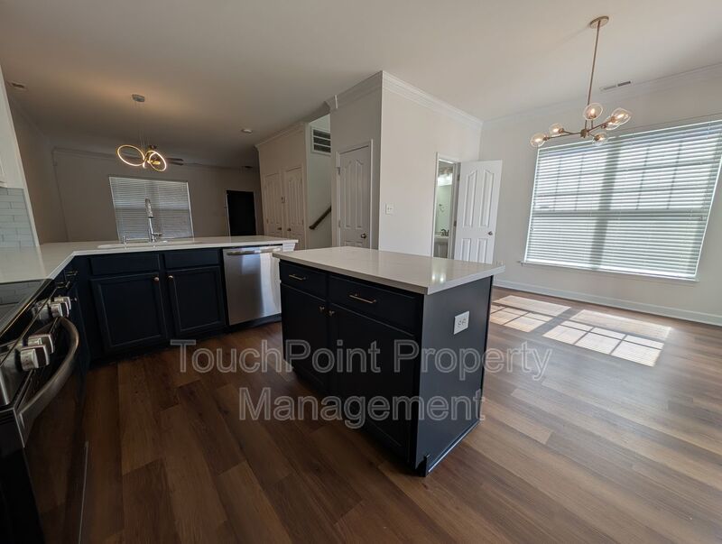 Pristine End Unit Townhome located in the Prosperity Place community! property image