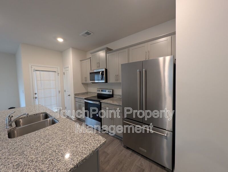 Lovely End Unit Townhome located in the Trinity Village community! property image