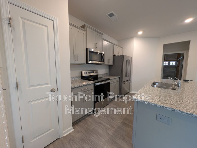 Lovely End Unit Townhome located in the Trinity Village community! property image